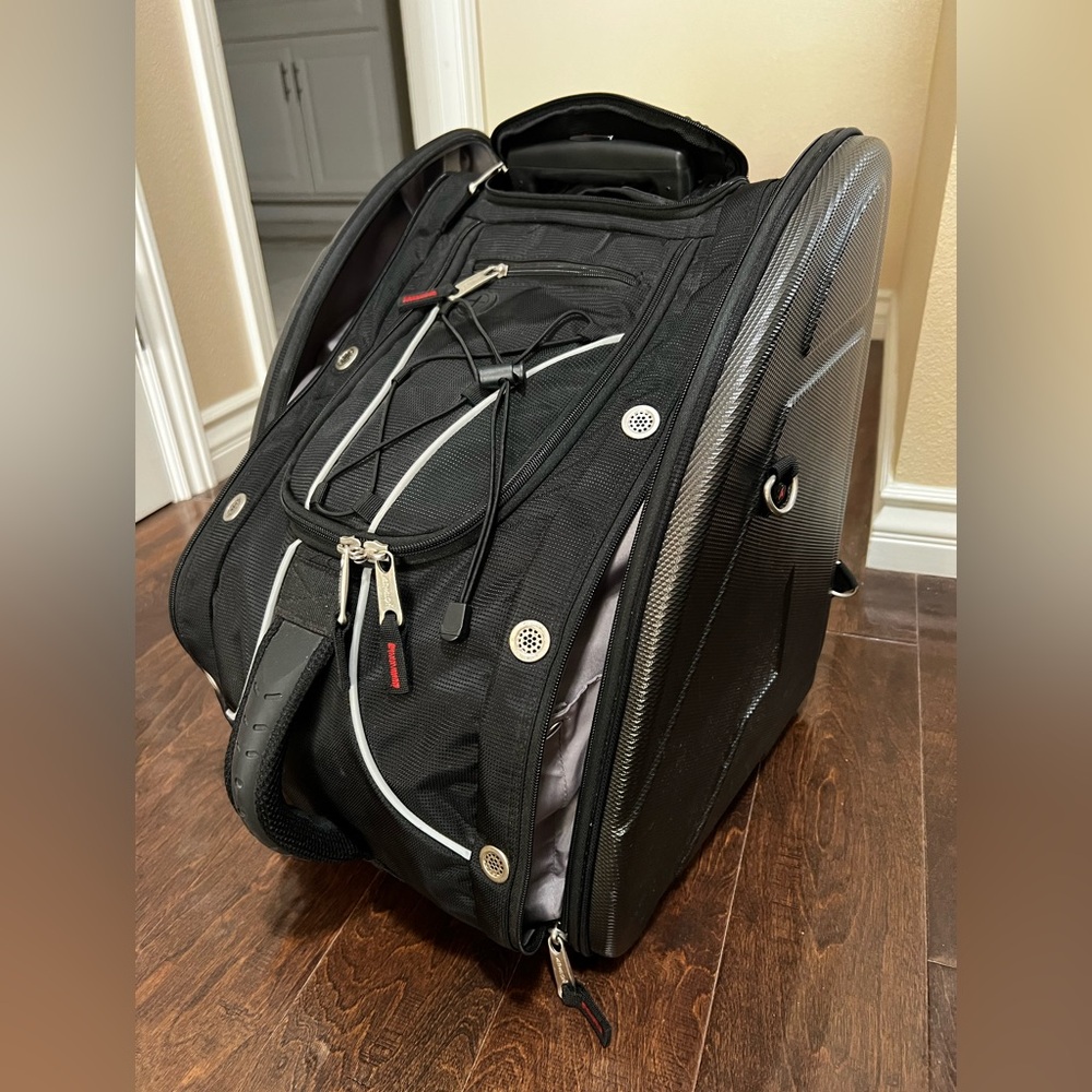 Sleek Black Travel Ski Backpack with Wheels. Great organizer for ski accessory.